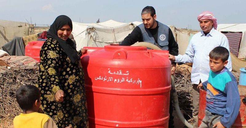 Water tank for refugees in Homs, Syria. Photo: GOPA